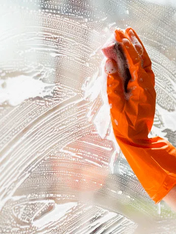 cleaning-window-with-sponge.webp